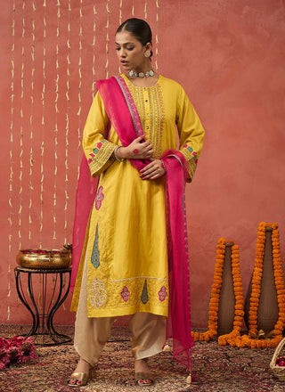 Yellow Pragaya Embroidered Silk Kali Kurta Set by Shivani Bhargava available on Indiaspopup.com