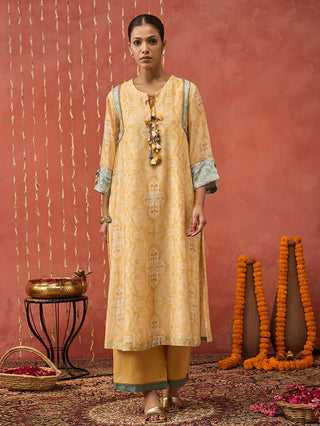Mustard Manjari Mughal Jaal Long Kurta Set by Shivani Bhargava available on Indiaspopup.com