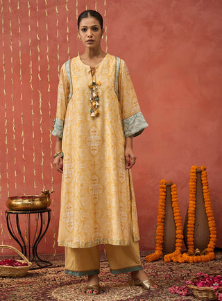 Mustard Manjari Mughal Jaal Long Kurta Set by Shivani Bhargava available on Indiaspopup.com