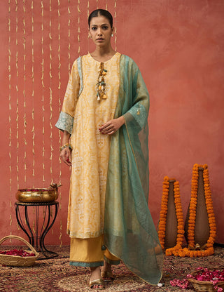Mustard Manjari Mughal Jaal Long Kurta Set by Shivani Bhargava available on Indiaspopup.com