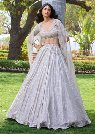 Adeline Ivory Silver Chiffon Lehenga And Cape Set by Dolly J, available on Indiaspopup.com