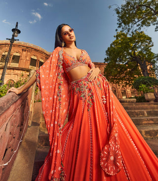 Orange Luckhnavi Lehenga Cape Set by Dolly J available on Indiaspopup.com