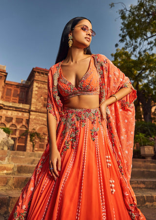 Orange Luckhnavi Lehenga Cape Set by Dolly J available on Indiaspopup.com