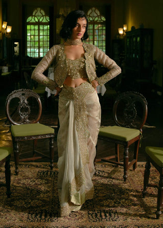Peral Gold Draped Skirt With Blouse And Jacket by Aditi Gupta available on Indiaspopup.com