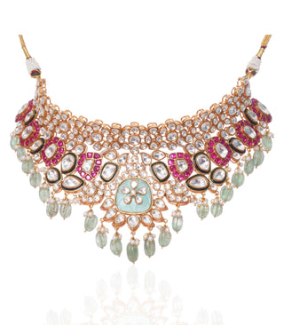 Niharika red and green polki necklace set