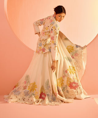 Ivory Pastel Peplum Jacket And Lehenga by Chandrima available on Indiaspopup.com