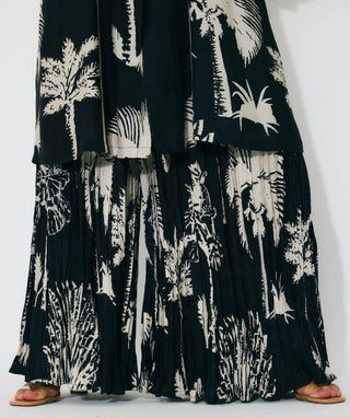 Black and beige floral shirt and pants