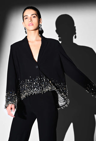 Noir blazer and bell bottom pants