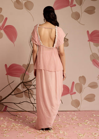 Dusty pink embellished peplum top and draped skirt