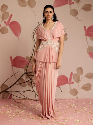 Dusty pink embellished peplum top and draped skirt