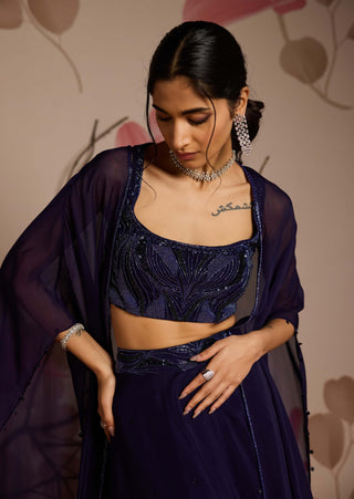 Midnight blue embellished choli, cape and lehenga