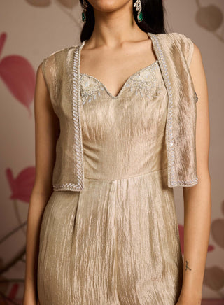 Gold embellished jacket and pleated jumpsuit