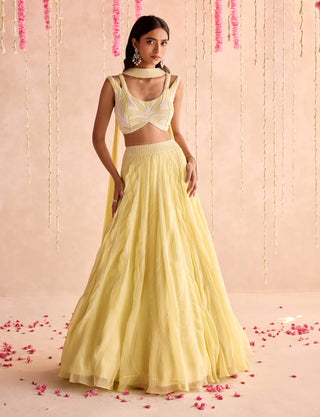 Lemon yellow choli and lehenga with stitched dupatta