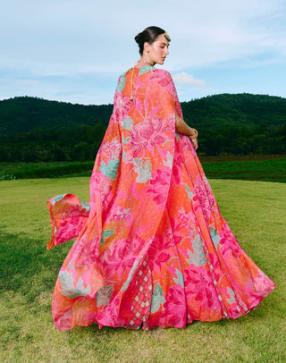 Dinnie sunset orange cape and lehenga set