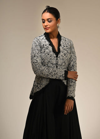 Black floral cutwork jacket and flared pants