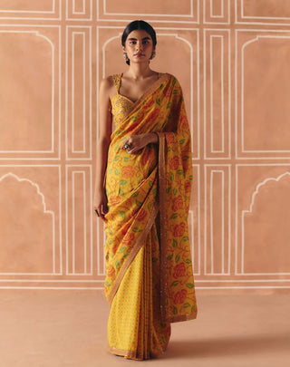 Marigold yellow printed sari and blouse