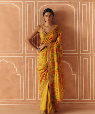 Marigold yellow printed sari and blouse