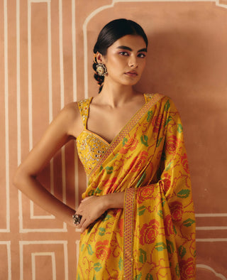 Marigold yellow printed sari and blouse