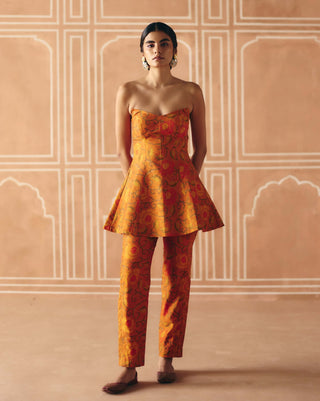 Burnt orange peplum and panelled pants