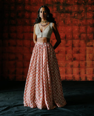 White Embroidered Blouse And Printed Lehenga Set by Drishti & Zahabia available on Indiaspopup.com