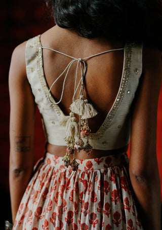 White Embroidered Blouse And Printed Lehenga Set by Drishti & Zahabia available on Indiaspopup.com