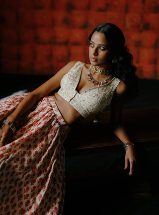 White Embroidered Blouse And Printed Lehenga Set by Drishti & Zahabia available on Indiaspopup.com