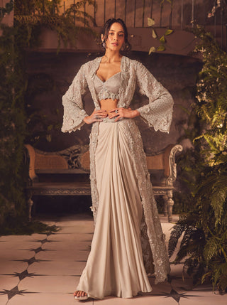 Demure ivory draped skirt and jacket set