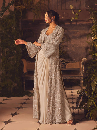 Demure ivory draped skirt and jacket set