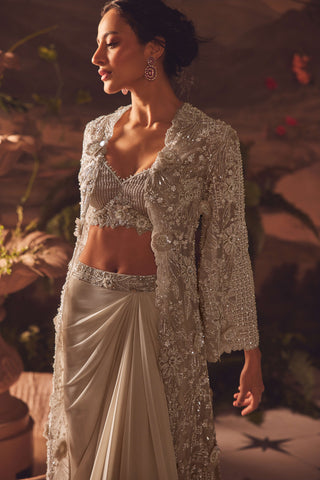 Demure ivory draped skirt and jacket set