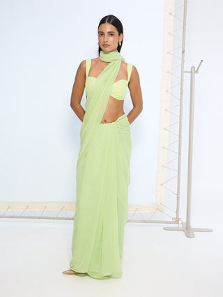 Green with white polka sari and blouse