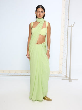 Green with white polka sari and blouse