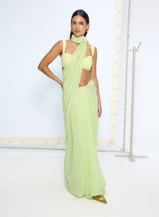 Green with white polka sari and blouse