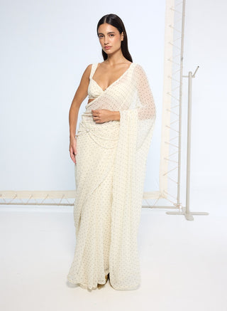 White polka dotted sari and blouse