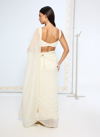 White polka dotted sari and blouse