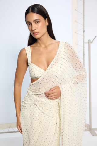 White polka dotted sari and blouse