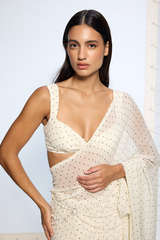 White polka dotted sari and blouse