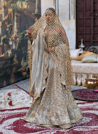 Ivory rajbaraat lehenga and sheeshya veil set