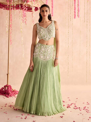 Mint green choli with attached dupatta and lehenga