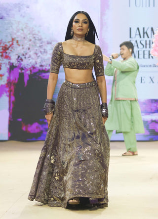 Baigani Metallic Lehenga Set by Punit Balana available on Indiaspopup.com