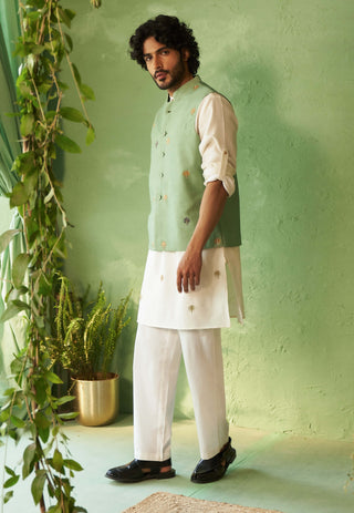 Off-white kurta and green bundi set