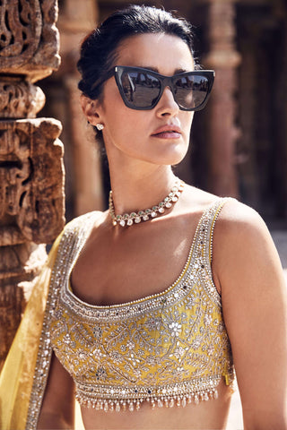 Royal Pyramid Turmeric Lehenga Set by Matsya available on Indiaspopup.com