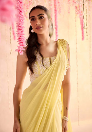 Lemon yellow embellished choli and pre-draped sari