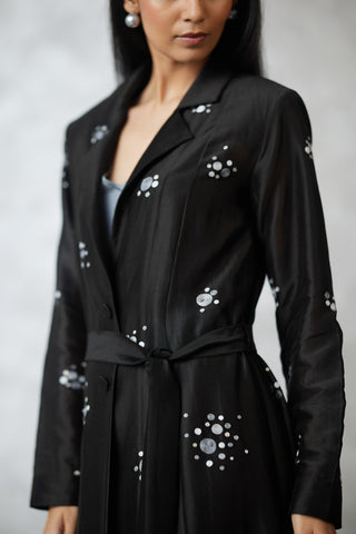 Black dottie jacket and gray dress