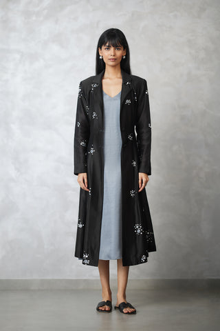 Black dottie jacket and gray dress