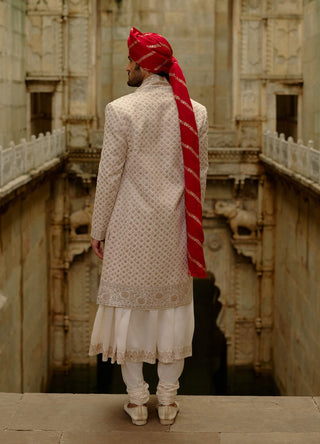 Cream sherwani jacket with choga and churidar set