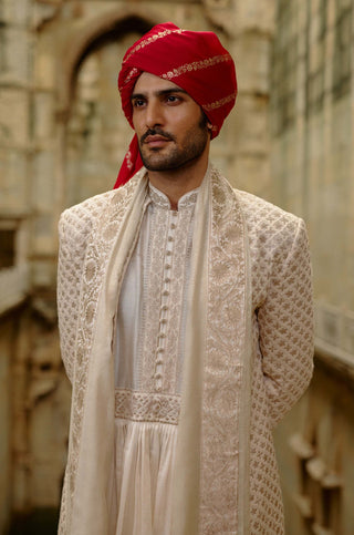 Cream sherwani jacket with choga and churidar set