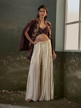 Nitika Gujral Burgundy Cape And Pleated Sharara Set available on indiaspopup