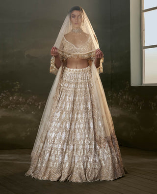 Nitika Gujral Ivory And Gold Lehenga Choli Set available on indiaspopup