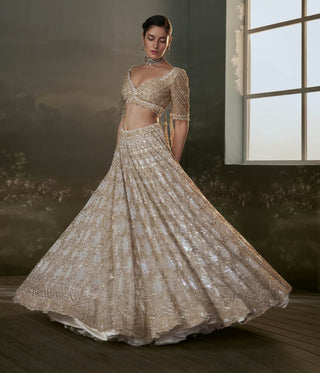 Nitika Gujral Ivory And Gold Lehenga Choli Set available on indiaspopup