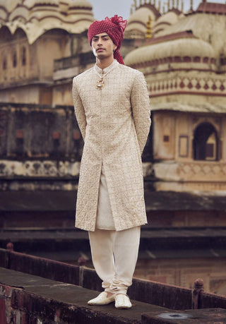 Light Beige Raw Silk Sherwani Set by Nitika Gujral Men available on Indiaspopup.com